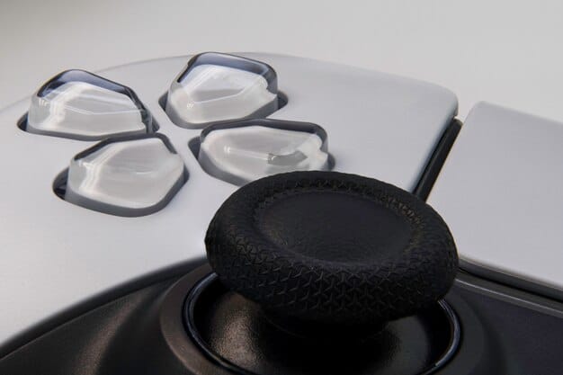 A close-up view of a game controller, specifically highlighting the right analog stick and the directional buttons commonly used for executing FIFA skill moves. The image is well-lit and focuses on the ergonomics of the controller.