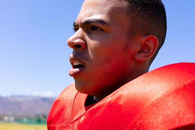 A close-up shot of a player's face expressing intense focus during a crucial moment in a FIFA 25 match, rendered with highly detailed facial expressions and realistic lighting, illustrating the visual fidelity brought by HyperMotionV.
