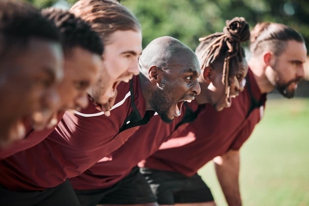 A group of diverse young soccer players actively participating in a drill on a sunny field, demonstrating teamwork and dedication, with a coach observing closely in the background providing instructions.