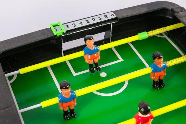 A tactical board with miniature soccer players, arrows showing player movement and formation adjustments. A hand holding a marker points to a key player, symbolizing squad depth and strategic planning.