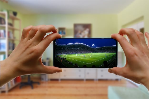 A close-up of a smartphone screen displaying a lively soccer-related Twitter feed with colorful team logos and multiple user avatars, hands holding the device in the foreground.