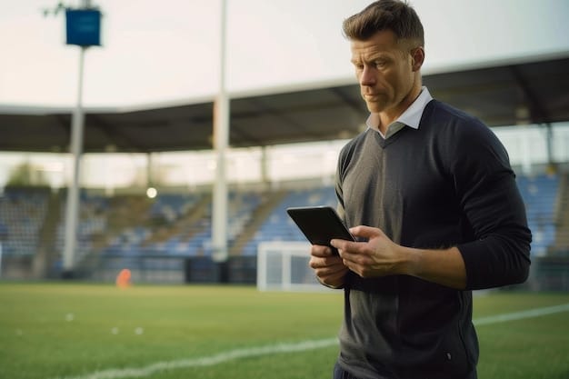 A soccer coach on the sideline looking at a tablet displaying real-time player data with 5G connectivity indicators.