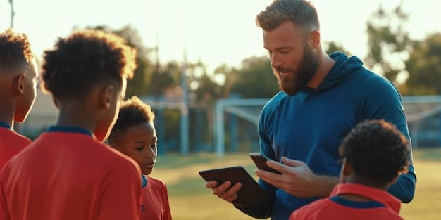 A diverse group of young soccer players engaged in a training session, with a coach reviewing tablet data on a cloud-based platform, symbolizing modern youth development.