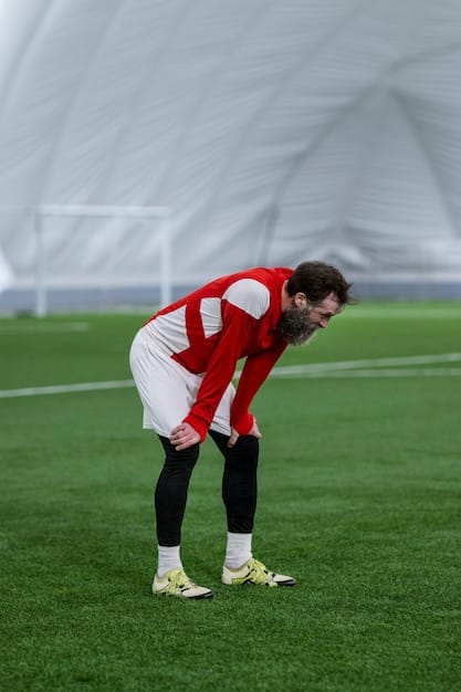A professional soccer player demonstrating a swift change of direction on a pitch, highlighting the agility provided by modern cleats.