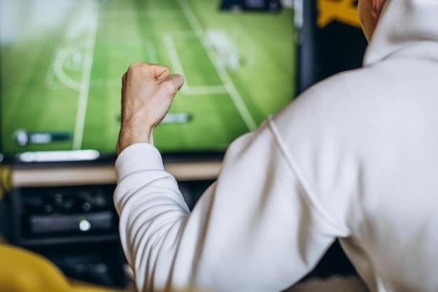 A close-up shot of a referee pointing to the VAR monitor on the sideline of a soccer field during a Major League Soccer (MLS) game. The crowd is visible in the background, watching with anticipation. The image highlights the referee's use of the technology and the tension of the moment. Includes the text 'FIFA's Technology Innovations: How VAR and Goal-Line Technology Are Evolving in US Soccer' as a watermark.