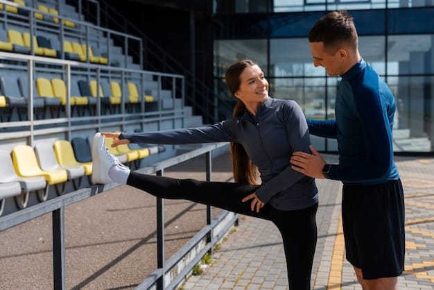 A medical staff member assisting a soccer player with stretching exercises during a training session in a US professional league facility. The scene emphasizes injury prevention and the role of medical professionals in maintaining player fitness, within the context of FIFA's Medical Regulations: Ensuring Player Safety in the US Professional Leagues.