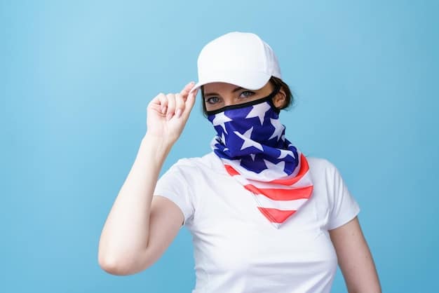 A close-up shot of a fan proudly wearing a US national team scarf and hat, with an American flag painted on their cheek. The background is a blurred stadium setting, highlighting the fan's enthusiasm and support for their team during the World Cup.