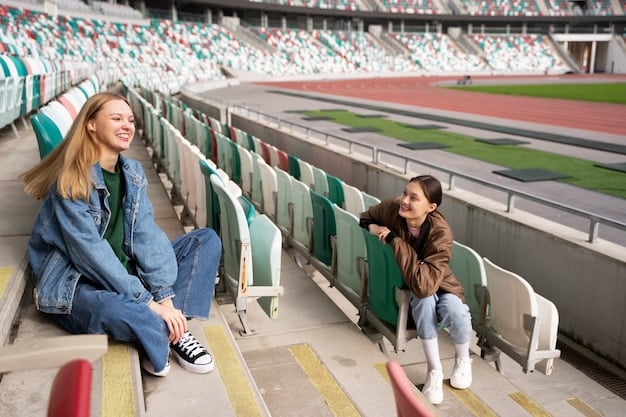 A shot of a diverse group of fans happily entering a stadium in Seattle, Washington, with improved accessibility features like ramps and wider walkways. Emphasis on inclusivity.