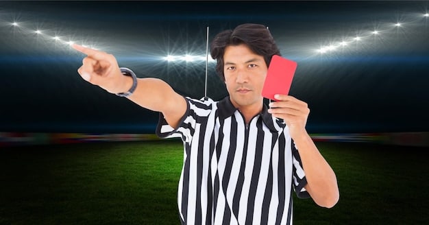 A soccer referee in a US Major League Soccer game pausing to communicate with the VAR team via his earpiece. The background shows players and a packed stadium, highlighting the impact of VAR decisions on the game. The image emphasizes real-time communication and decision making in How is VAR Technology Evolving in Major US Soccer Leagues in 2025?.