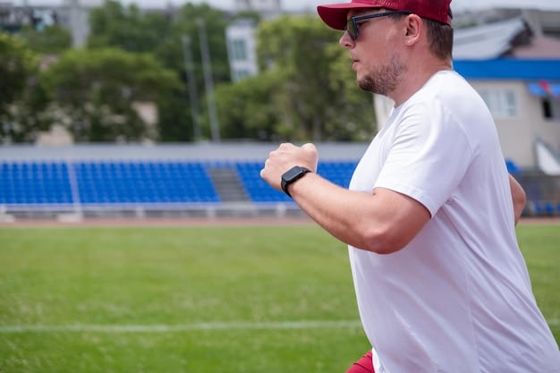 A close-up of a US Soccer referee wearing a smartwatch displaying real-time biometric data, like heart rate and distance covered, during a professional match. The background shows a blurred view of the field and players in action, emphasizing the integration of wearable tech in soccer officiating to improve decision-making. The focus is clearly on How are US Soccer Referees Using Technology to Improve Accuracy and Consistency in Decision-Making.