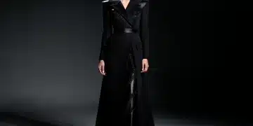Model in Givenchy 2026 black architectural dress, embodying contemporary elegance.